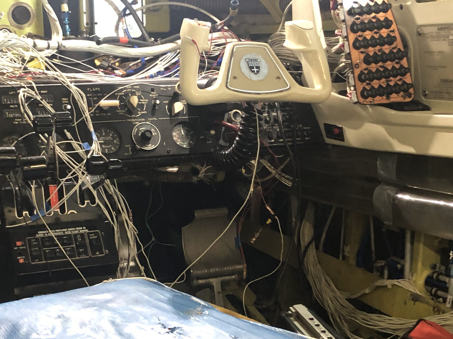 Panel stripped, wiring exposed